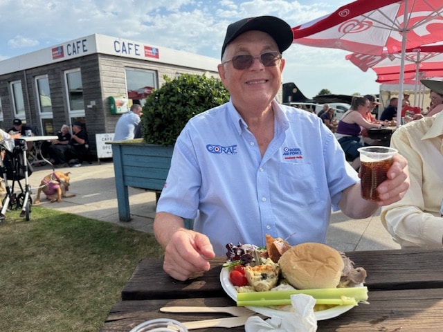 Bob tucking into the provided food and drink